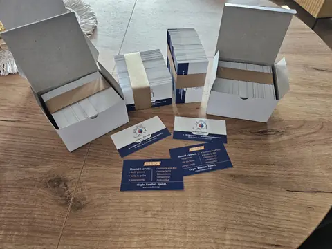 Wizytówki firmy WMD Instal w pudełkach po druku